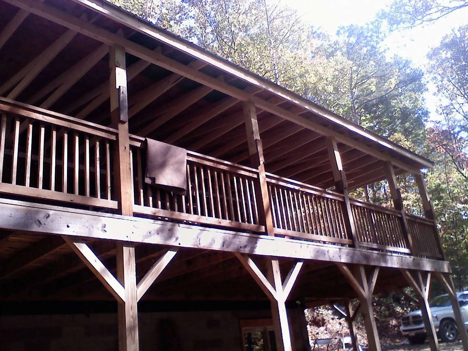 Timber framing under a new elevated porch and deck — Roof Leak Repair in Wellsville by Roofing Brothers